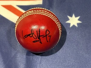 Nathan Hauritz (Australia) signed Red Cricket Ball + COA + Photo proof signing - Picture 1 of 8
