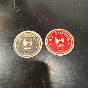 2x ULTRA RARE AC COMICS VENOM POG MILK CAPS RED + BLACK LOT - Picture 1 of 4