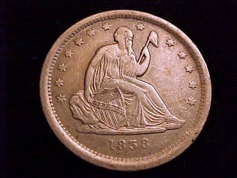 1838 Seated Liberty Quarter, Extra Fine Grade.  The first year Cover