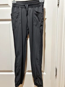 Girl’s Ivivva by Lululemon Black Full-Length Running Active Pants Zip Sz 10 - Picture 1 of 9