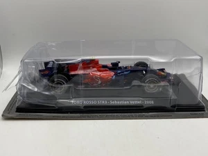1:24 Toro Rosso STR3 Sebastian Vettel 2008 F1 Hachette Diecast WRINKLED BLISTER - Picture 1 of 2