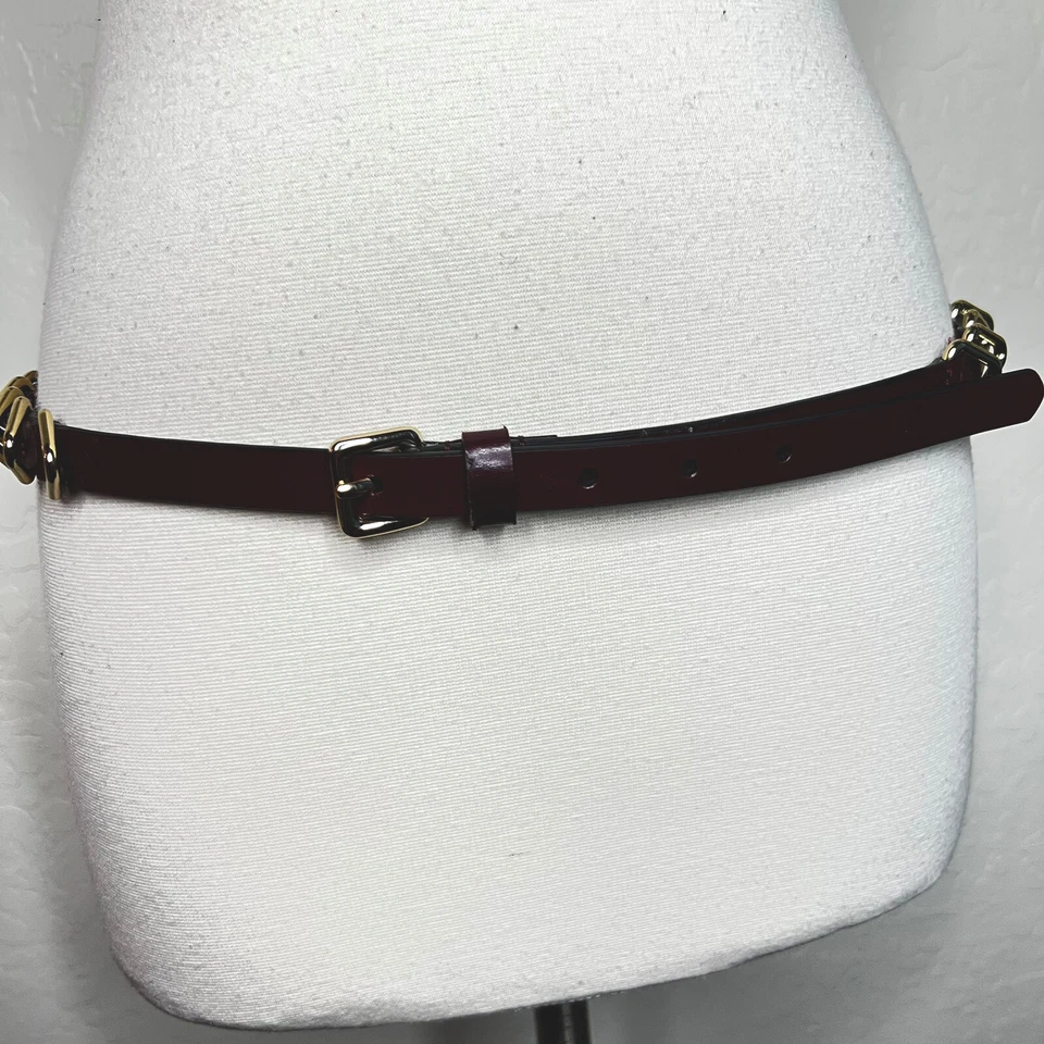 Cinturón Rebecca Minkoff Metal Triángulo Cuero Rojo Granate Tawny Port M Foto 1 de 4