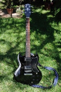 Guitarra Eléctrica Jay Turser JT-50 SG Estilo - Negra con Herrajes Plateados - Imagen 1 de 9