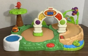 Fisher-Price Amazing Animals Spinnin' Around Musical Zoo Playset - Picture 1 of 7