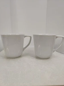Juego de 2 tazas blancas de té de café de porcelana Sur La Table - Imagen 1 de 7
