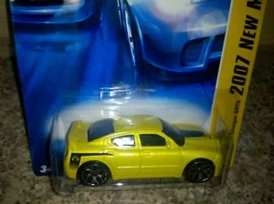 HOT WHEELS 2007 DODGE CHARGER SRT8 1:64 GELB Neu - Bild 1 von 1