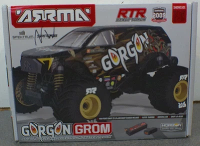 Monster Truck ARRMA Gorgon Grom 4x4 escala 1/16 cepillado bronce ARA2130T3 Foto 1 de 4