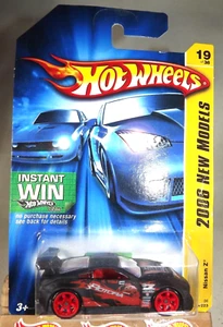 2006 Hot Wheels #19 New Models 19/38 NISSAN Z Flat Black w/Red A6 Spoke '07 Card - Picture 1 of 5