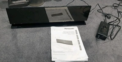 COMPACT AIRPLAY STEREO SYSTEM PANASONIC SC-AP01 with instruction manuals - Image 1 of 4