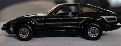 Matchbox Datsun 280 ZX 1982 2+2 puertas turbo abiertas doradas y negras Foto 1 de 4