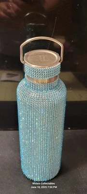 Botella de agua de metal con estrás con cristales de Swarovski azules TOMO Foto 1 de 4