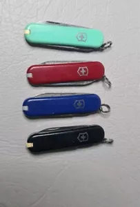 4 VINTAGE FOLDING Victorinox SWISS ARMY UTILITY POCKET KNIFE Stainless Rostfrie - Picture 1 of 8