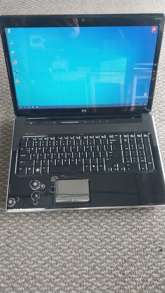 HP Pavilion dv7 17" Turion II Dual-Core M620 4GB 120GB SSD Win 10 PROBLEMA BATERÍA Foto 1 de 4