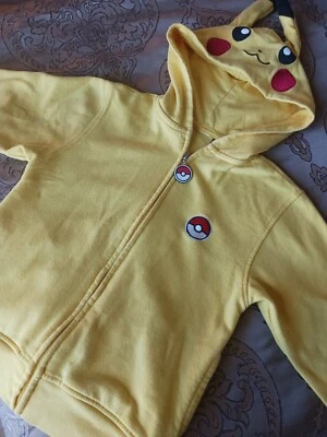 NIÑOS XS POKÉMON SUDADERA CON CAPUCHA CREMALLERA OREJAS AMARILLAS COLA ESTAMPADA EN REVERSO  Foto 1 de 4