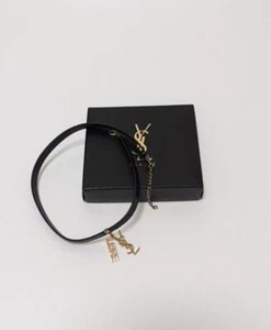 Collana girocollo Yves Saint Laurent oro nero novità gioielli non in vendita - Foto 1 di 4