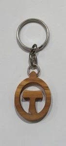 Portachivi ovale con Tau in legno di ulivo. - Imagen 1 de 1