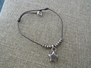 Uno De 50 Unisex Brown cord Silver Star Charm Bracelet 7" NWOT - Picture 1 of 2