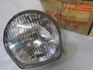 NOS Suzuki OEM Stanley 6V 15/15W Headlight 1971-1972 TS50 Gaucho 35121-22610 - Picture 1 of 3