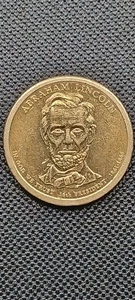 2010 P Lincoln Golden Dollar " Struck Thru " Error Coin - Picture 1 of 4