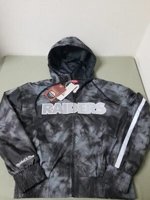 Nuevo cortavientos reflectante Mitchell & Ness para mujer NFL Oakland Raiders Galaxy. Foto 1 de 4