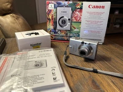 Canon PowerShot S400 Digital ELPH 4MP Camera w/Box, Manual, Charger, 2 Batteries - Image 1 of 4