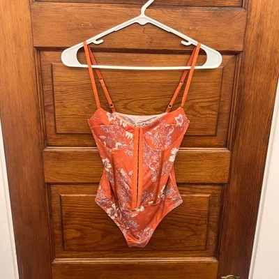 Free People Night Rhythm Printed Bodysuit Size XS NWTs Terra Cotta Orange $58 - Image 1 of 4