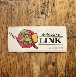 Vintage 1989 Legend of Zelda Link & Sword Nintendo Topps Game Tip Sticker RARE 80s! - Bild 1 von 3