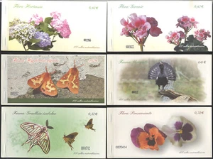 ¡RARISIMO! - JUEGO COMPLETO 14 CARNETS ADHESIVOS AÑO 2009 ** MNH - Imagen 1 de 3