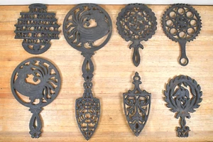 LOT of 8 Vtg Cast Iron Trivets Wilton Iron Art JHZ etc - Picture 1 of 17