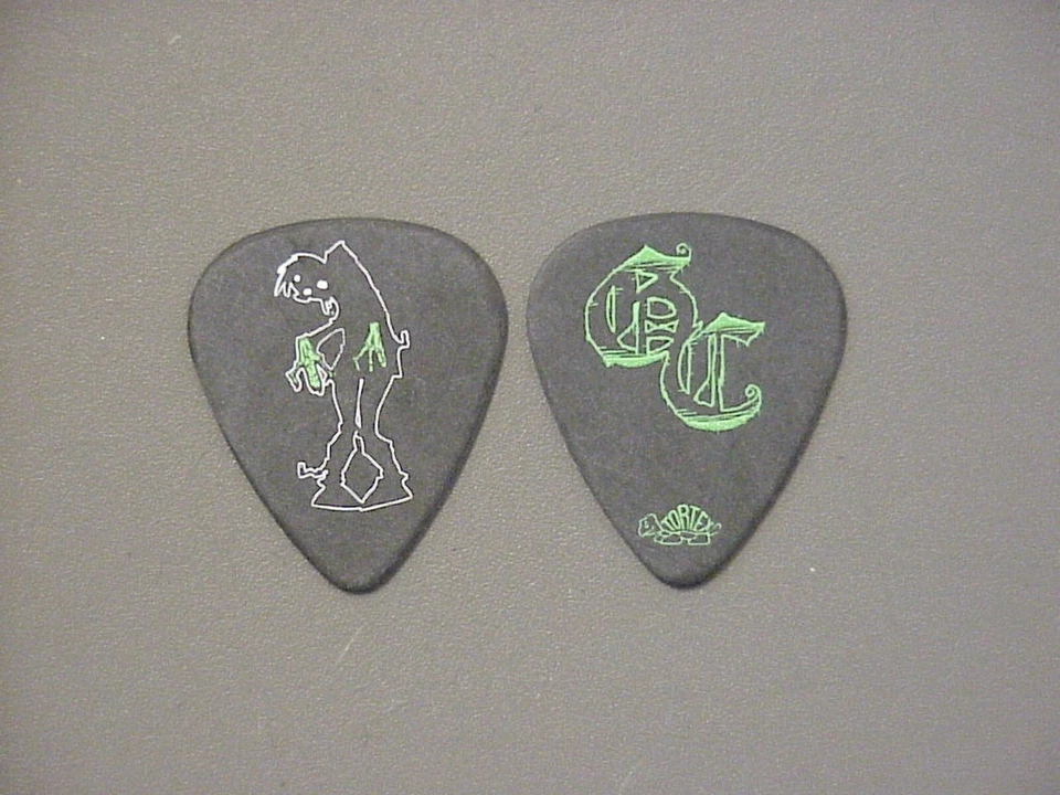 Good Charlotte guitar pick green Billy Martin monster - Image 1 of 1