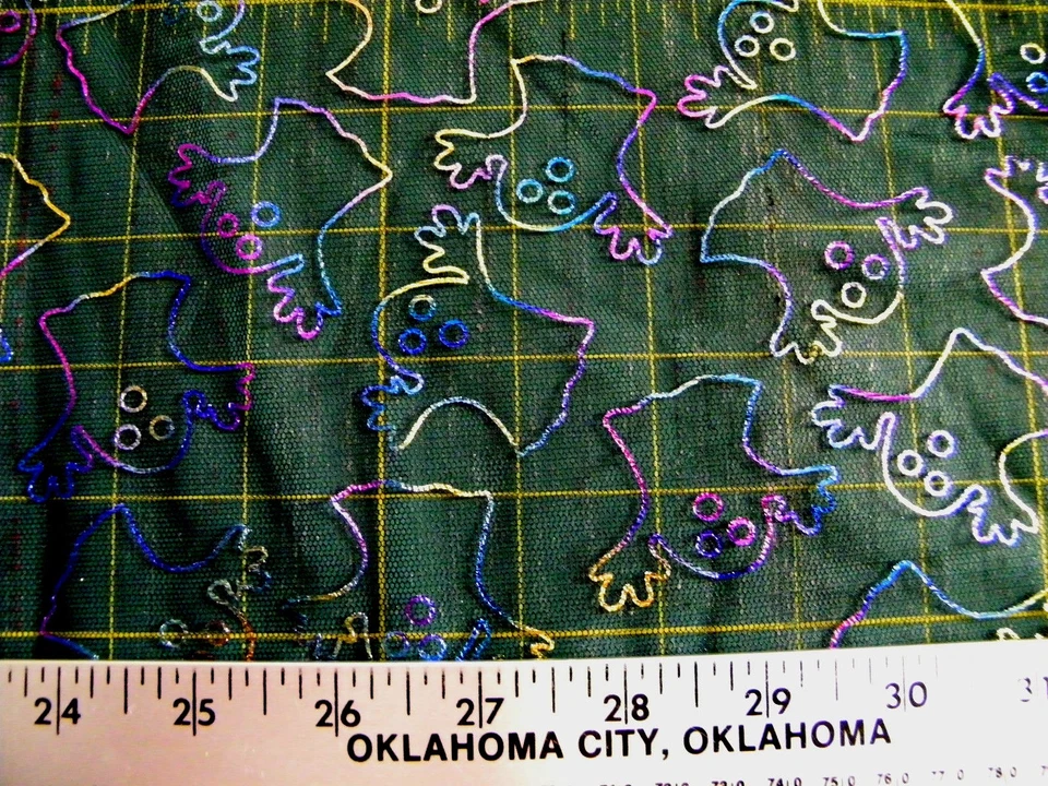 MULTI COLORED METALLIC GHOSTS ON SHEER BLACK MESH FABRIC 32X45 INCHES - Image 1 of 1