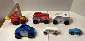 Melissa & Doug Holzfahrzeuge 6 Stück Krankenwagen Polizei Feuerwehr Eislader - Bild 1 von 13