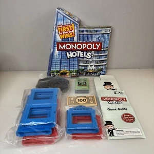 Monopoly Hotels Board Game Hasbro Build Your Hotel 2012 Part Sealed Inside Xmas - Picture 1 of 11