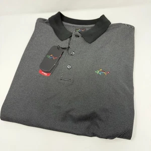 NWT Greg Norman Polo Shirt Men's Large Black Polyester Golf Logo Play Dry - Picture 1 of 7