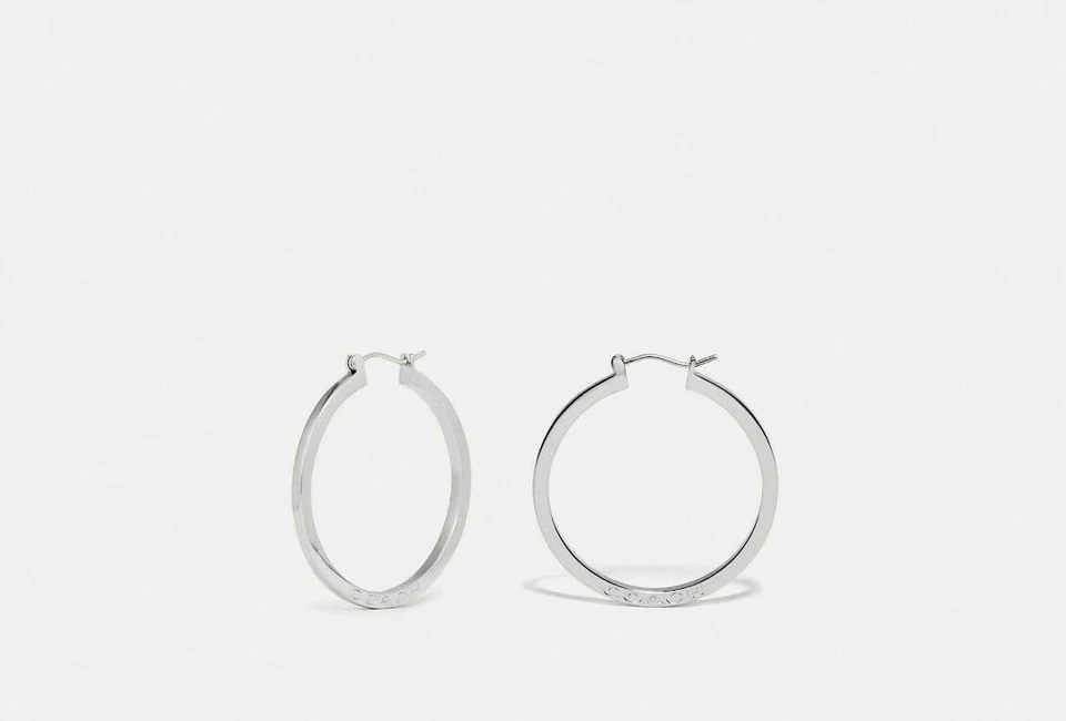 Nuevos pendientes de aro de plata COACH F73022 Foto 1 de 1