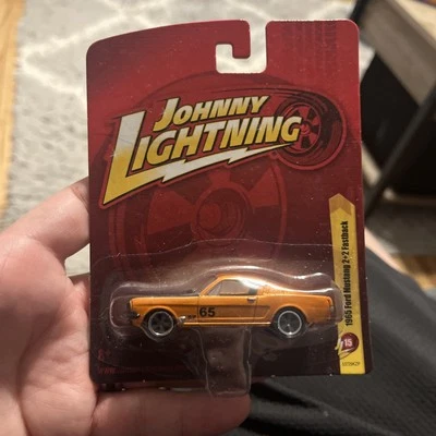 2011 Johnny Lightning Forever 64 JL15 1965 FORD MUSTANG 2+2 FASTBACK Orange w5Sp - Image 1 of 4