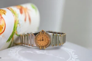 Reloj Omega Constellation para mujer de oro de 18 quilates y acero inoxidable con bisel de diamantes, 23 mm - Imagen 1 de 9