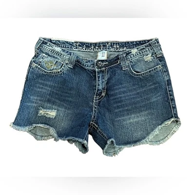 Pantalones cortos de mezclilla de algodón industrial para mujer talla 11 con dobladillo festoneado Foto 1 de 4