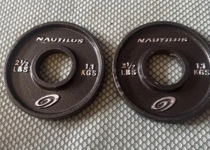"Par de placas de peso olímpicas Nautilus de 2,5 libras - 2 placas 5 libras en total raras 2"" 2,5 X 2" - Imagen 1 de 19
