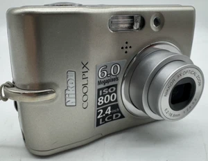 Nikon COOLPIX L11 6.0 MP Digital Camera 3x Zoom 2.4" LCD Silver W/ Box Tested - Picture 1 of 19