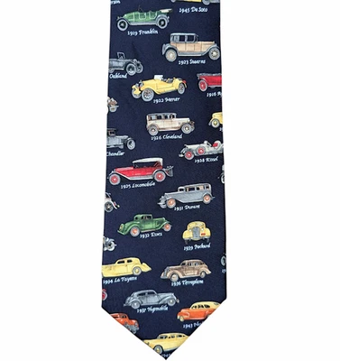Шелковый галстук ALYNN «Антикварные автомобили» темно-синий с классическими автомобилями б/у в отличном состоянии - Изображение 1 из 4