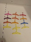 Vintage Barbie 13 Multicolored Rainbow Filigree Hangers Lot Mattel