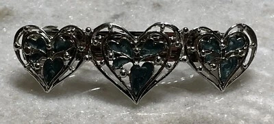 Broche de pinza para el cabello vintage de corazones calados en tono plateado Foto 1 de 4