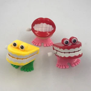 10 un. juguetes dentales de regalo/juguetes de plástico dientes de salto con cadena para niños - Imagen 1 de 12