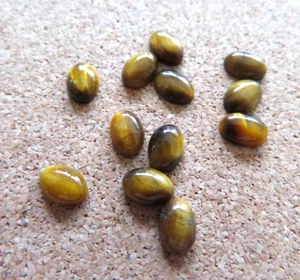 12 NATURAL TIGER'S EYE CABOCHONS FOR JEWELLERY MAKING - 7X5mm OVALS - Picture 1 of 3