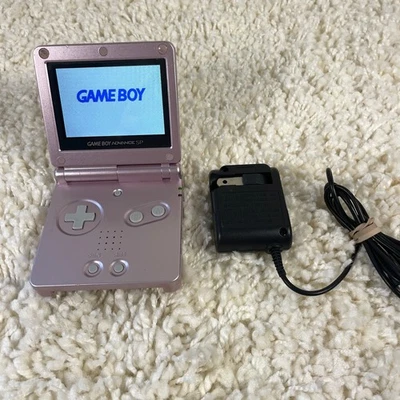 Sistema portátil Nintendo Gameboy Advance GBA SP rosa perla AGS-101 probado Foto 1 de 4