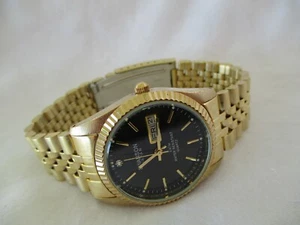 Reloj de pulsera Swanson tono dorado indicador de fecha de día resistente al agua 50M - Imagen 1 de 12