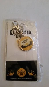 COLLECTIBLE CORONA BEER PROMO KEYCHAIN KEY RING LOGO ROUND NEW IN PACKAGE - Picture 1 of 1