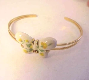 Vintage Cuff Bracelet AVON Gold Tone White Ceramic Yellow Flowers Butterfly - Picture 1 of 5
