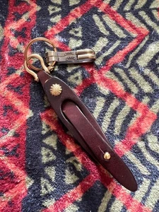 RRL RALPH LAUREN LLAVERO HOMBRE COLOR MARRÓN USADO - Imagen 1 de 4